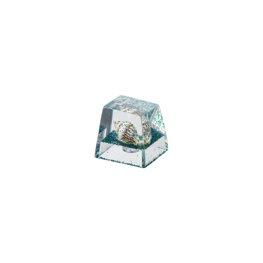 Keycap artesanal de resina de búzio